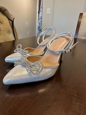 BCBGeneration Silver Crystal Bow Pointed Toe Ankle Strap Heels